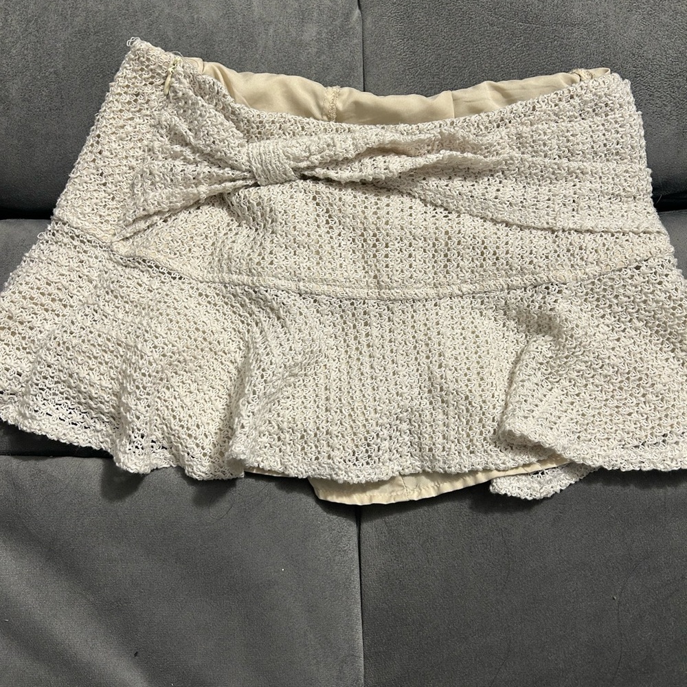 Cream Textured Mini Skirt with Bow Detail